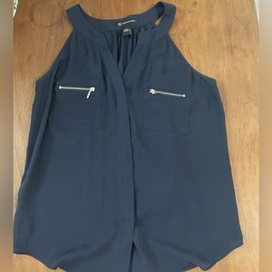 Navy tank top with two zippers in the front. Size large